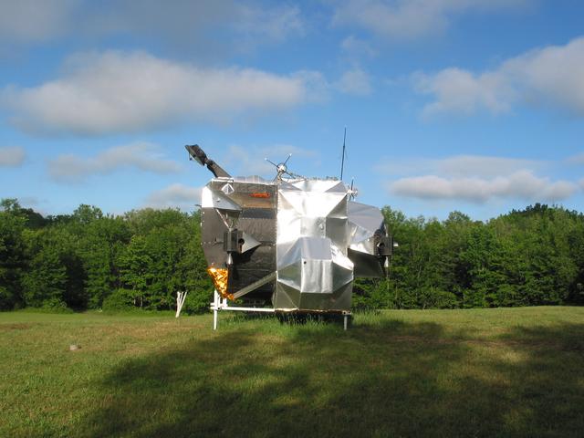 LEM, 2003-2007, 13'X11'X14', aluminum, steel, epoxy, wood, rubber, money
Exterior left side