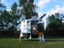 LEM, 2003-2007, 13'X11'X14', aluminum, steel, epoxy, wood, rubber, money
Exterior, right side