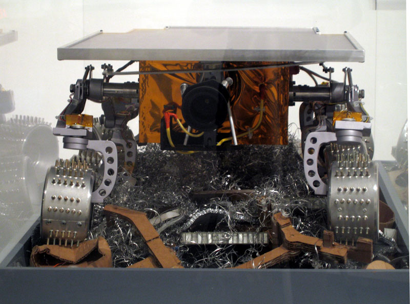 Limited Intelligence Marginally Produced Exploration Rover (LIMPER)
2007, aluminum, urethane, acrylic, mylar, cardboard, paper, Kapton, electronics, 12 3/4 x 31 x 21 inches (32 x 79 x 53 cm)
Back detail showing VANDALizer(Variable Although Never Determined Artistic Label - izer).