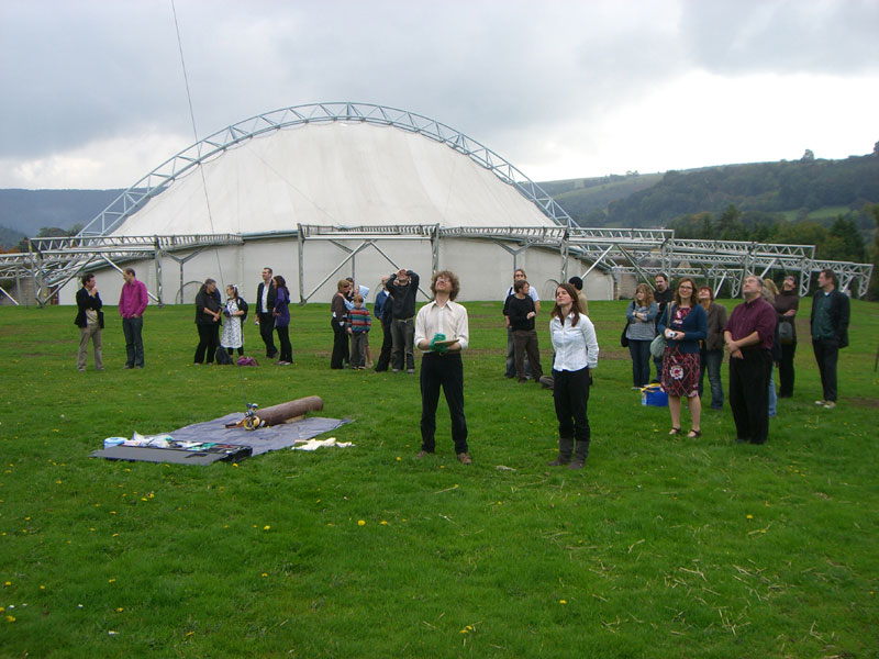 Observers and mourners at Royal International Pavilion just after launch of BPL 001 with Conrad Carpenter's ashes.  Note wistful expression on Dominic Chennel, at center.